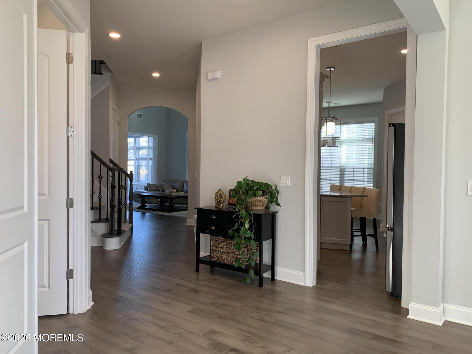 67 Samjan Circle Hightstown, NJ 08520 - Photo 3 of 22 a lobby with furniture and a potted plant