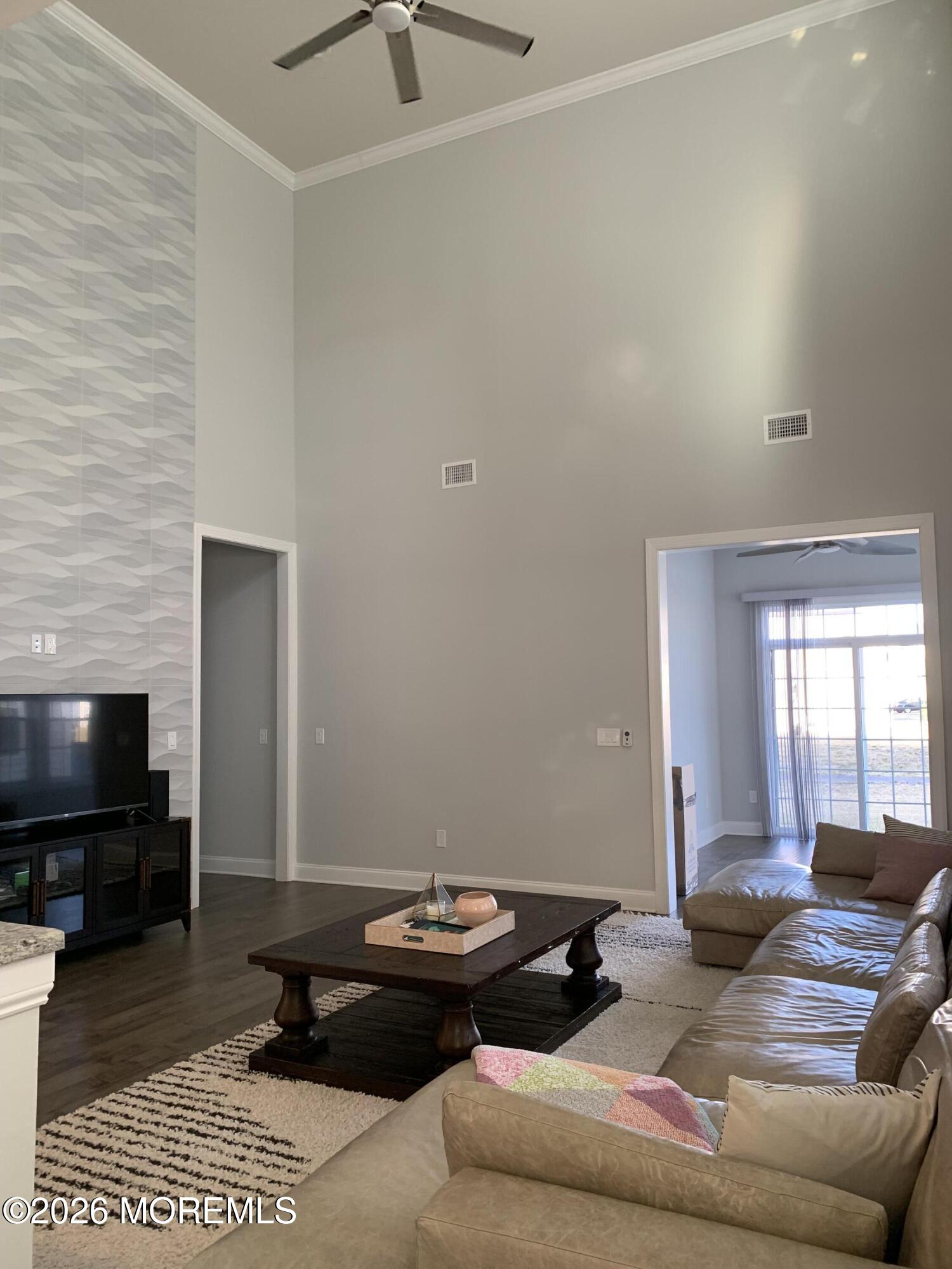 67 Samjan Circle Hightstown, NJ 08520 - Photo 7 of 22 a living room with furniture and a flat screen tv