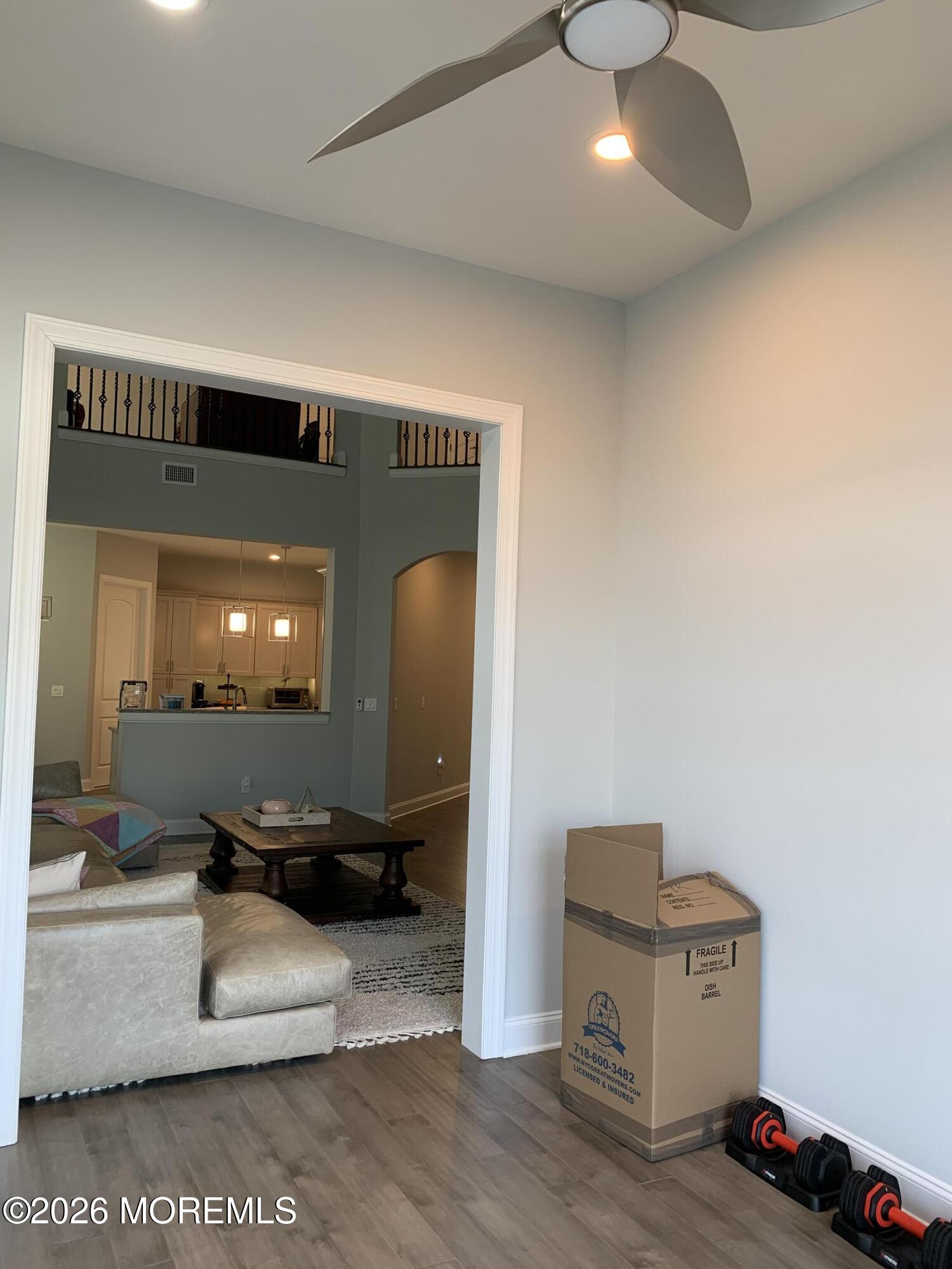 67 Samjan Circle Hightstown, NJ 08520 - Photo 8 of 22 a living room with furniture and a wooden floor