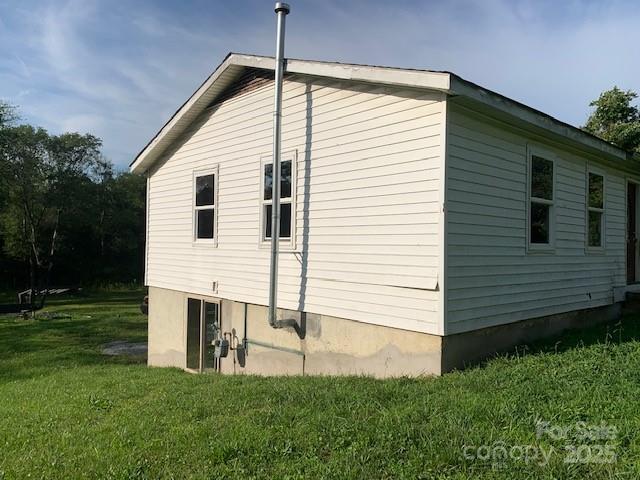 286 Berkeley Road Hendersonville, NC 28792 - Photo 20 of 23 a view of a house with a yard