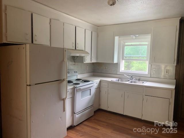 286 Berkeley Road Hendersonville, NC 28792 - Photo 6 of 23 a kitchen with stainless steel appliances a refrigerator sink and cabinets