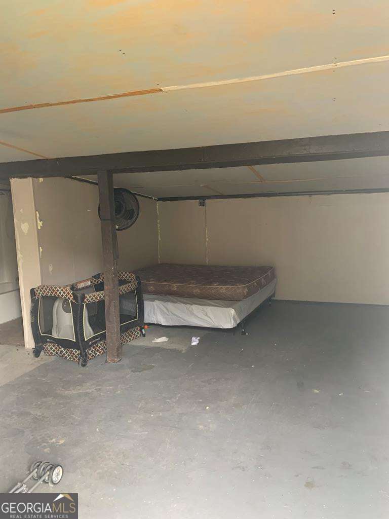 606 West 7th Street Alma, GA 31510 - Photo 27 of 28 a view of a room with racks on the wall