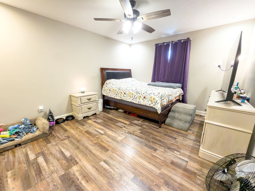 392 Scott Road Sharon Grove, KY 42280 - Photo 23 of 36 a bedroom with a bed dresser and a window