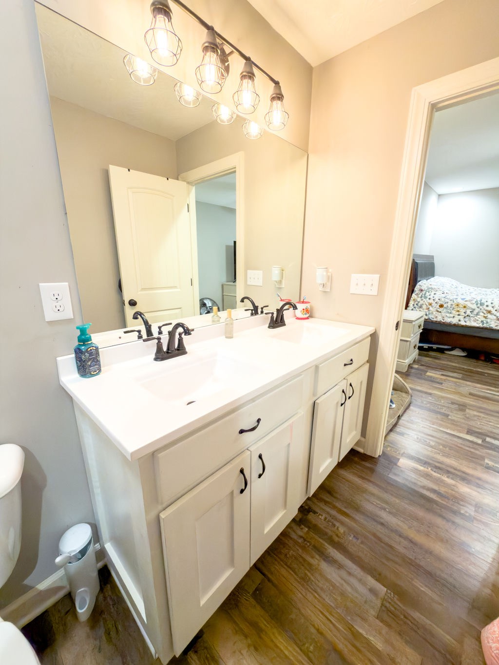 392 Scott Road Sharon Grove, KY 42280 - Photo 24 of 36 a bathroom with a double vanity sink and a mirror