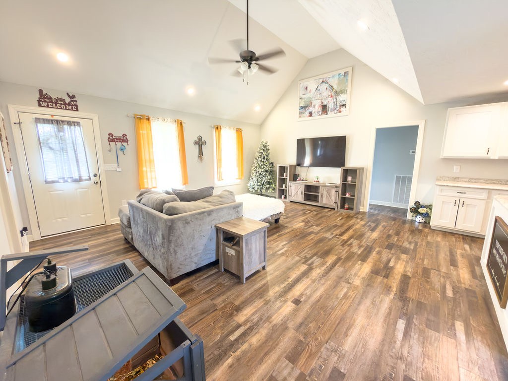 392 Scott Road Sharon Grove, KY 42280 - Photo 26 of 36 a living room with furniture and a flat screen tv