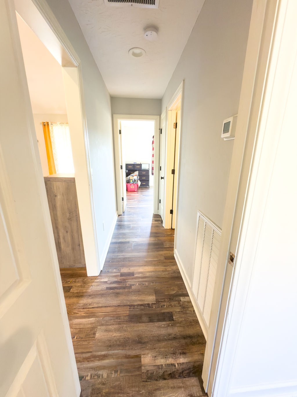 392 Scott Road Sharon Grove, KY 42280 - Photo 27 of 36 a view of a hallway with wooden floor and staircase