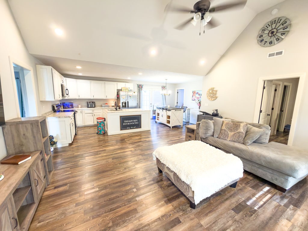 392 Scott Road Sharon Grove, KY 42280 - Photo 31 of 36 a living room with furniture and a wooden floor