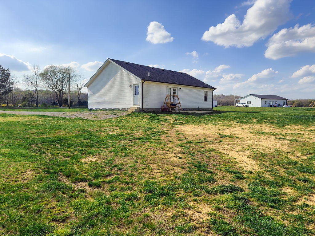 392 Scott Road Sharon Grove, KY 42280 - Photo 33 of 36 a house view with a garden space