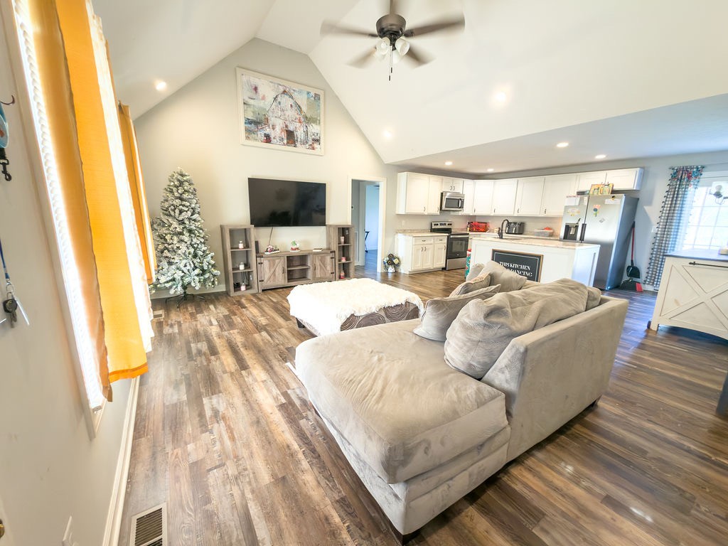 392 Scott Road Sharon Grove, KY 42280 - Photo 5 of 36 a living room with furniture and a flat screen tv
