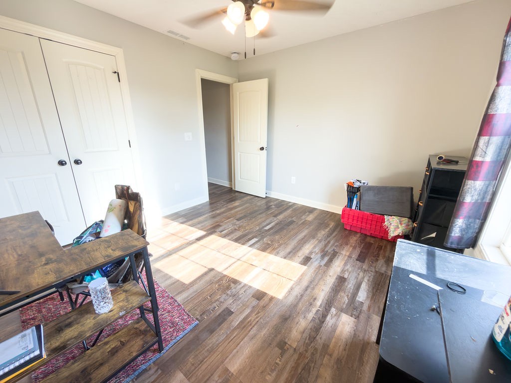 392 Scott Road Sharon Grove, KY 42280 - Photo 8 of 36 a bedroom with a bed and a mirror