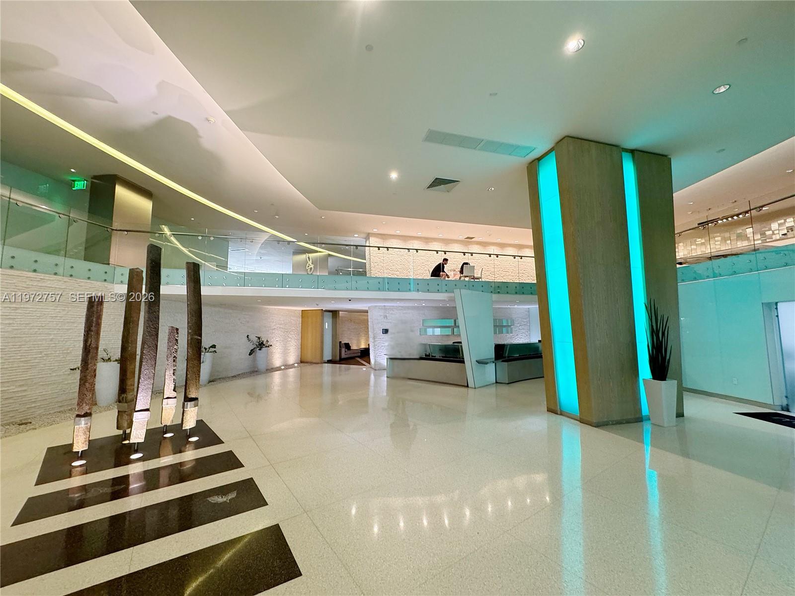 92 Southwest 3rd Street, Unit 3912 Miami, FL 33130 - Photo 33 of 33 a lobby with furniture and floor