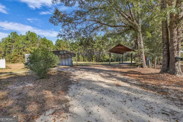 a house with trees in front of it