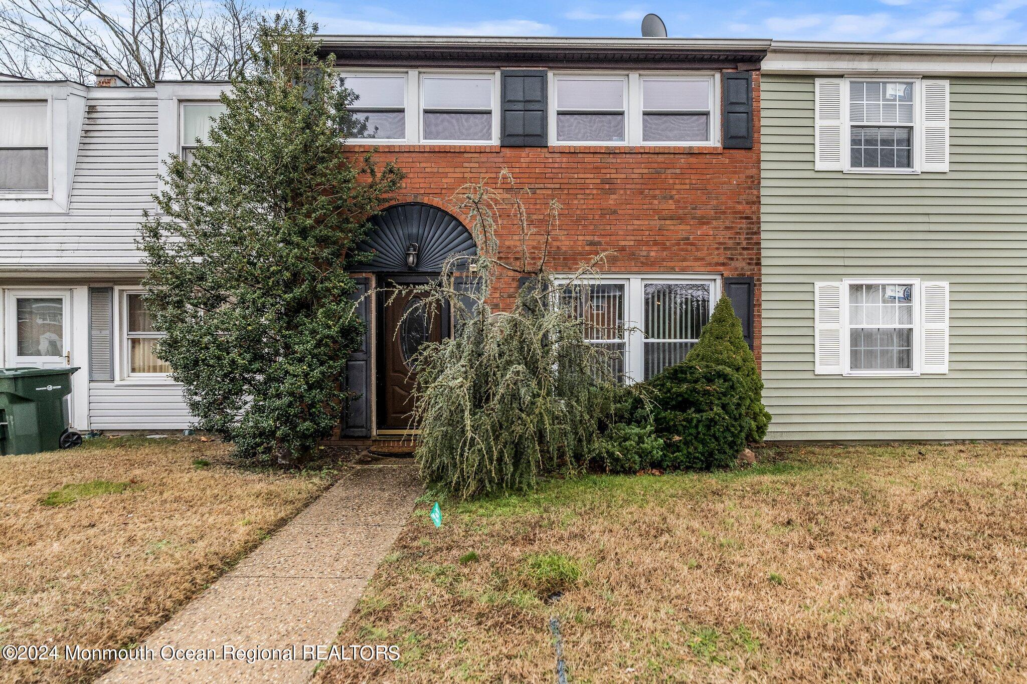 a front view of house with yard