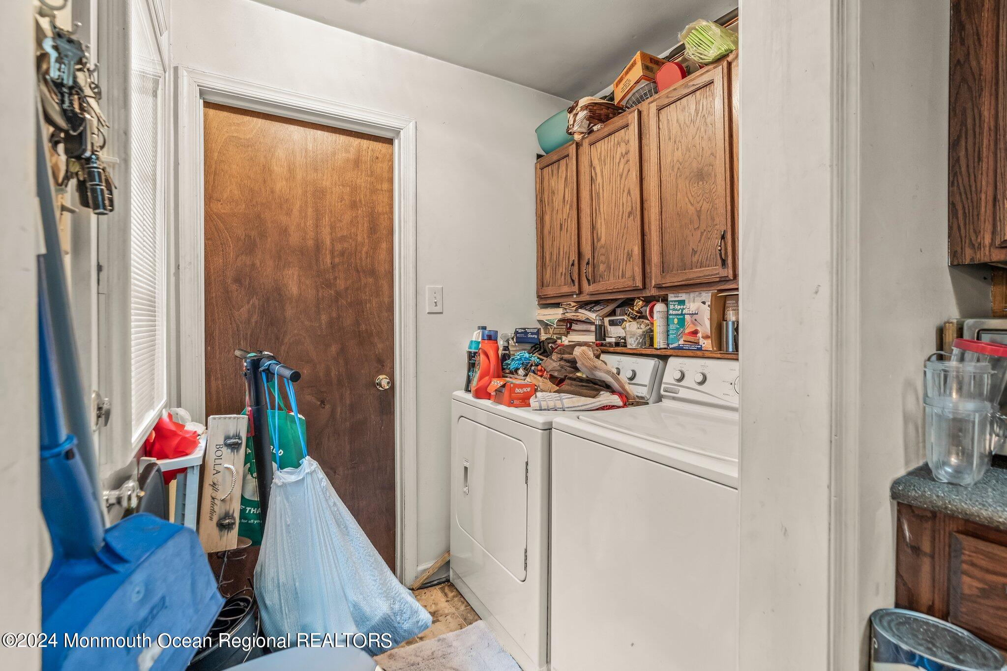 9 Radcliff Place Willingboro, NJ 08046 - Photo 6 of 15 a storage room with washer and dryer