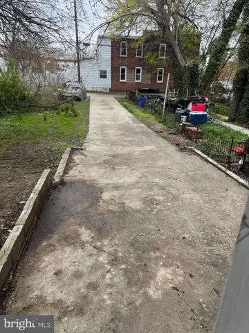 a house view with a garden space