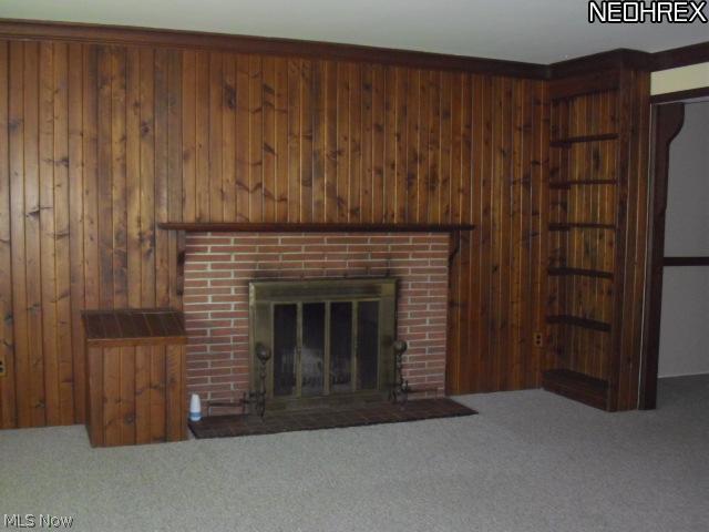 116 Mapleridge Road Chagrin Falls, OH 44022 - Photo 5 of 10 Wood burning fireplace, for those cold winter nights. built in book cases