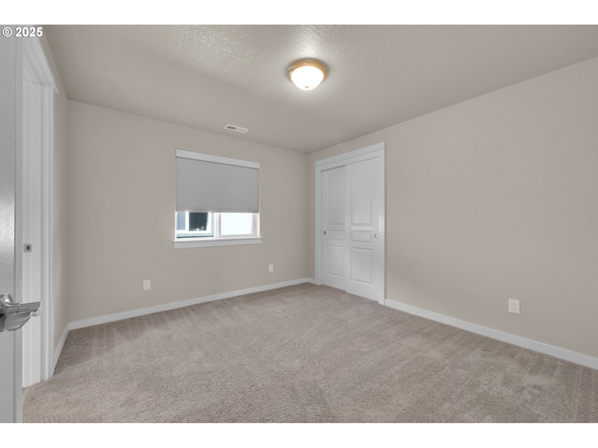 3015 Guadalupe Way Eugene, OR 97408 - Photo 31 of 48 a view of an empty room with a window