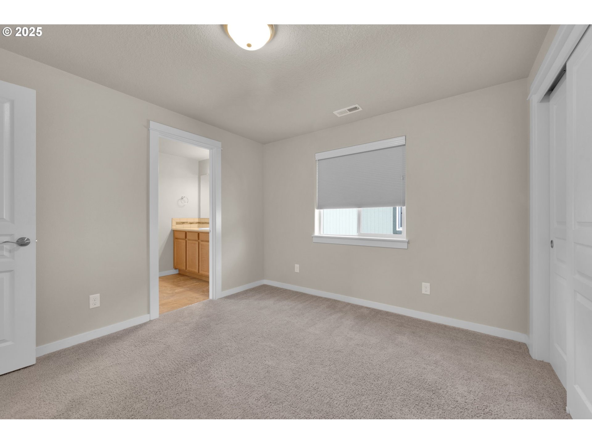 3015 Guadalupe Way Eugene, OR 97408 - Photo 32 of 48 a view of an empty room with a window