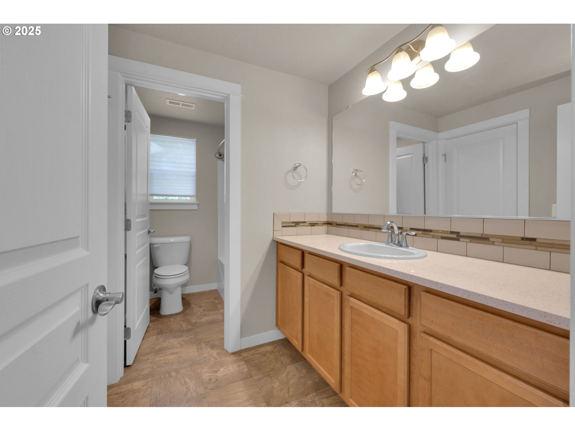 3015 Guadalupe Way Eugene, OR 97408 - Photo 33 of 48 a bathroom with a sink and a mirror