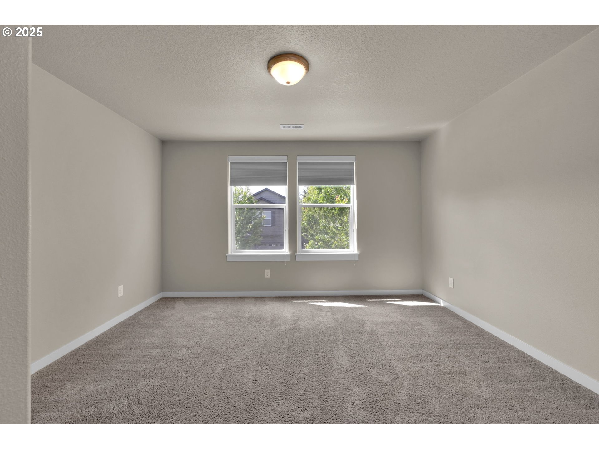 3015 Guadalupe Way Eugene, OR 97408 - Photo 38 of 48 a view of an empty room with a window