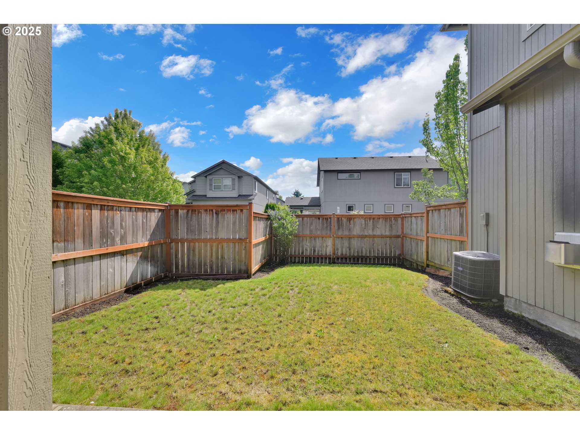 3015 Guadalupe Way Eugene, OR 97408 - Photo 43 of 48 a view of backyard with small cabin and wooden fence