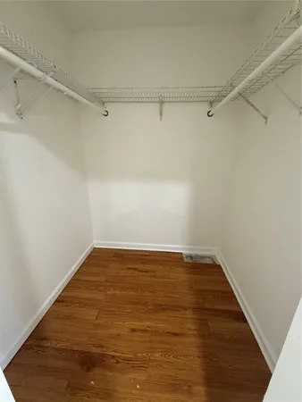 a kitchen with stainless steel appliances granite countertop a stove a sink dishwasher a refrigerator and a microwave