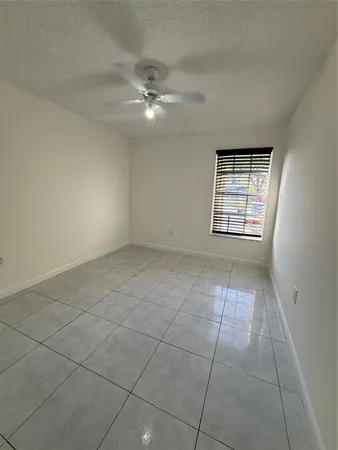 a utility room with cabinets