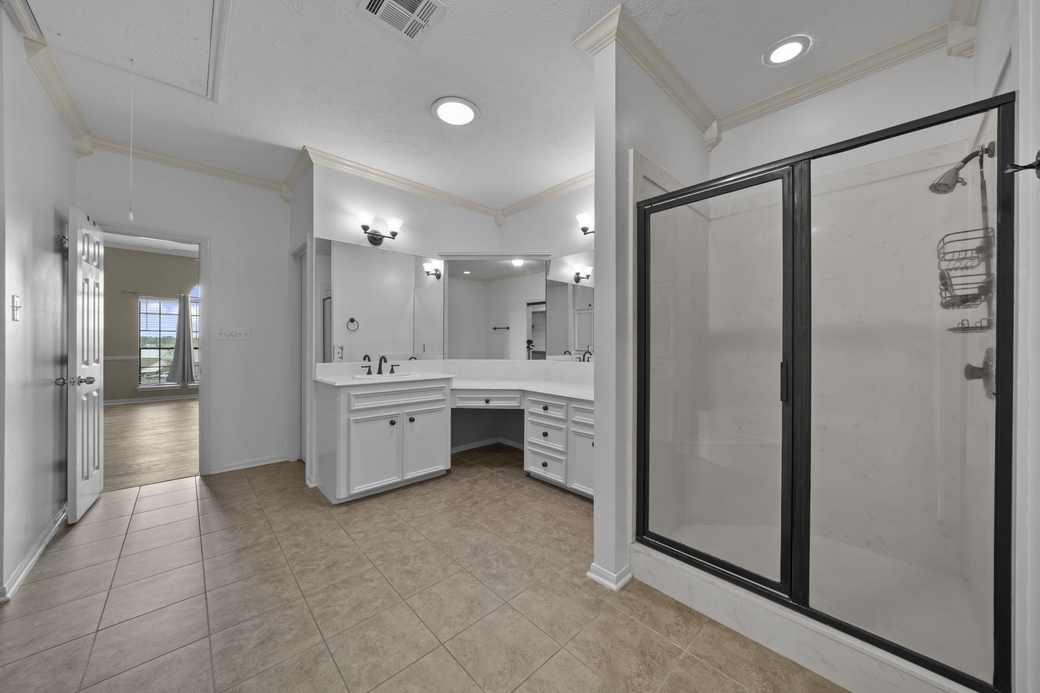 169 April Cove Montgomery, TX 77356 - Photo 14 of 39 Highlighting an amazing glass enclosed shower.