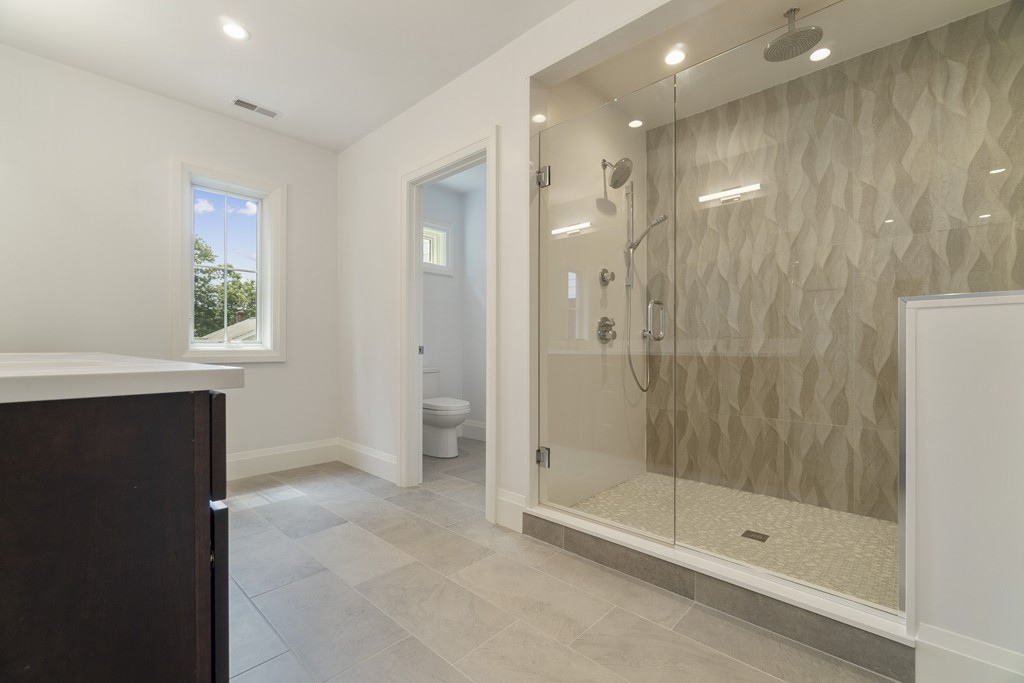 30 Coyne Road, Unit 30 Newton, MA 02468 - Photo 12 of 25 a bathroom with a shower