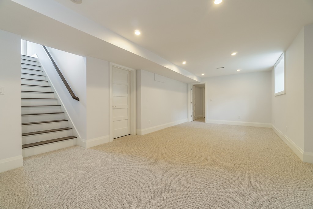30 Coyne Road, Unit 30 Newton, MA 02468 - Photo 18 of 25 a view of an empty room with stairs