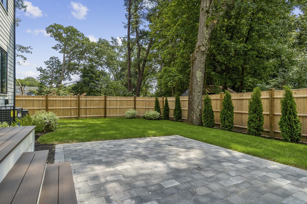 30 Coyne Road, Unit 30 Newton, MA 02468 - Photo 23 of 25 a view of a yard and entertaining space