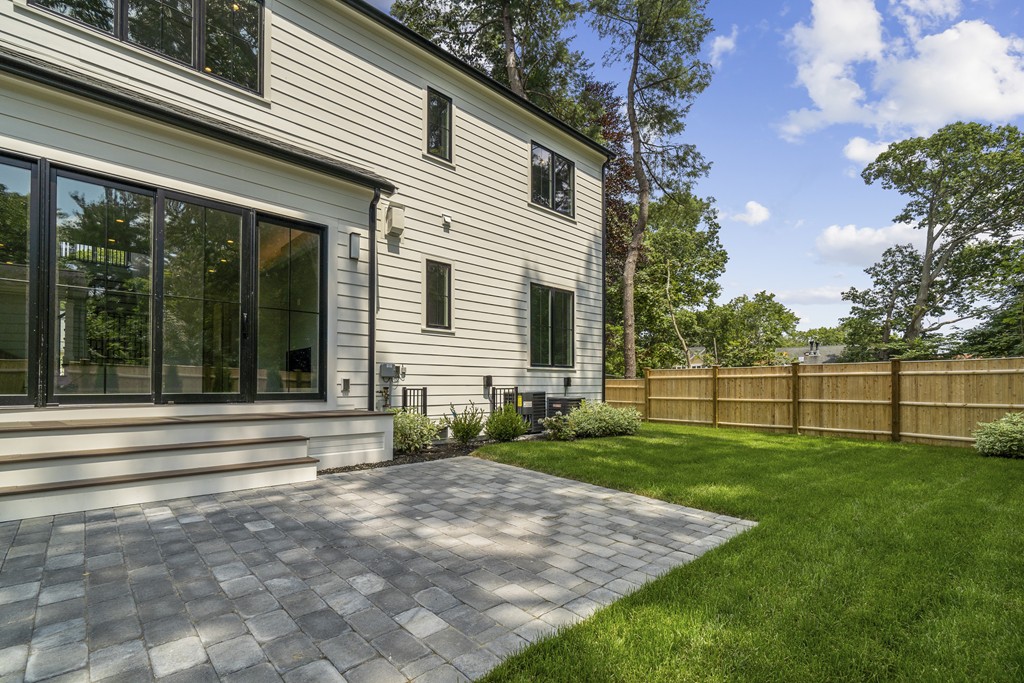30 Coyne Road, Unit 30 Newton, MA 02468 - Photo 24 of 25 a view of a backyard with a plants and trees