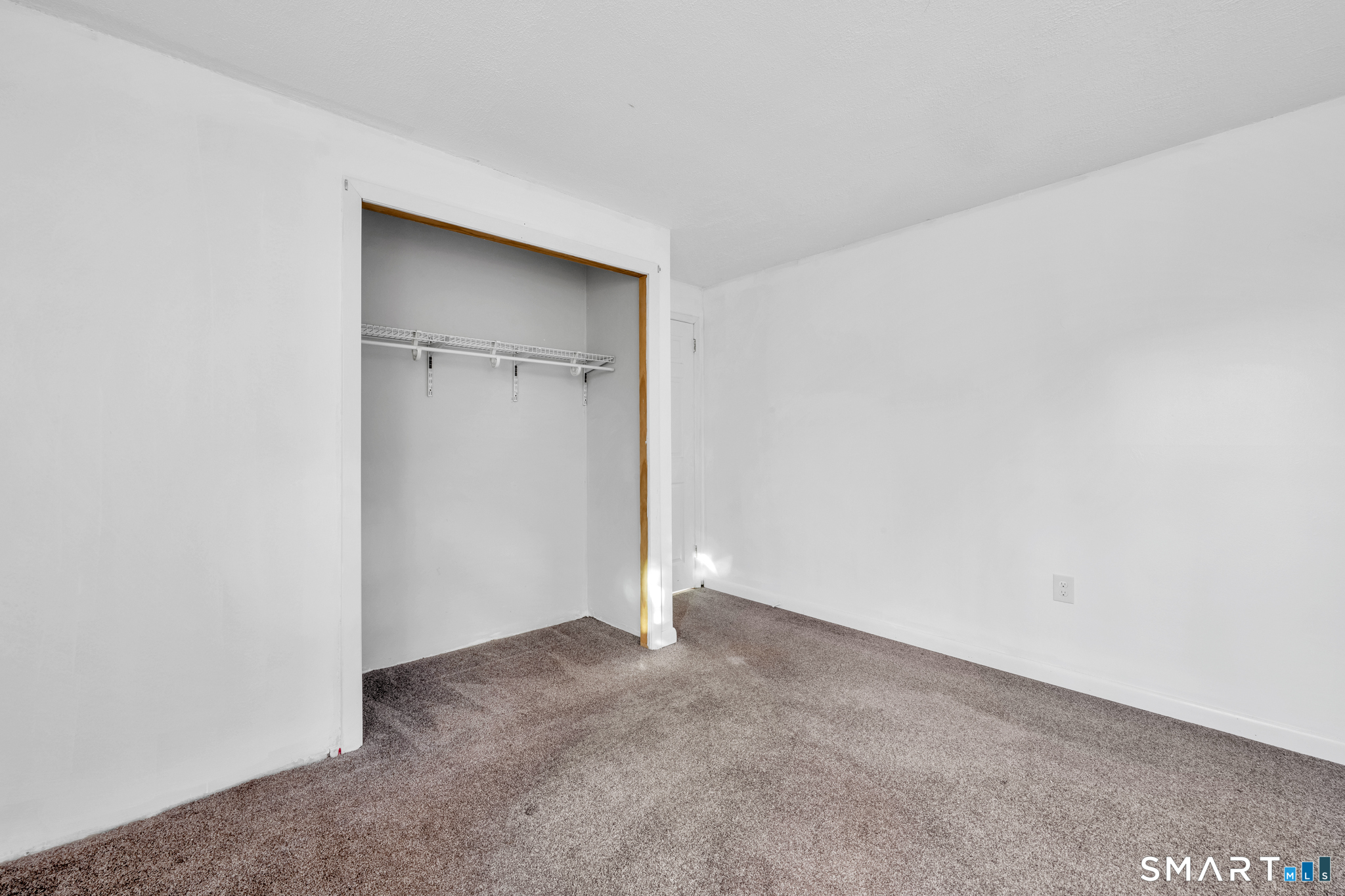 12 Nutmeg Drive Clinton, CT 06413 - Photo 20 of 26 a view of an empty room