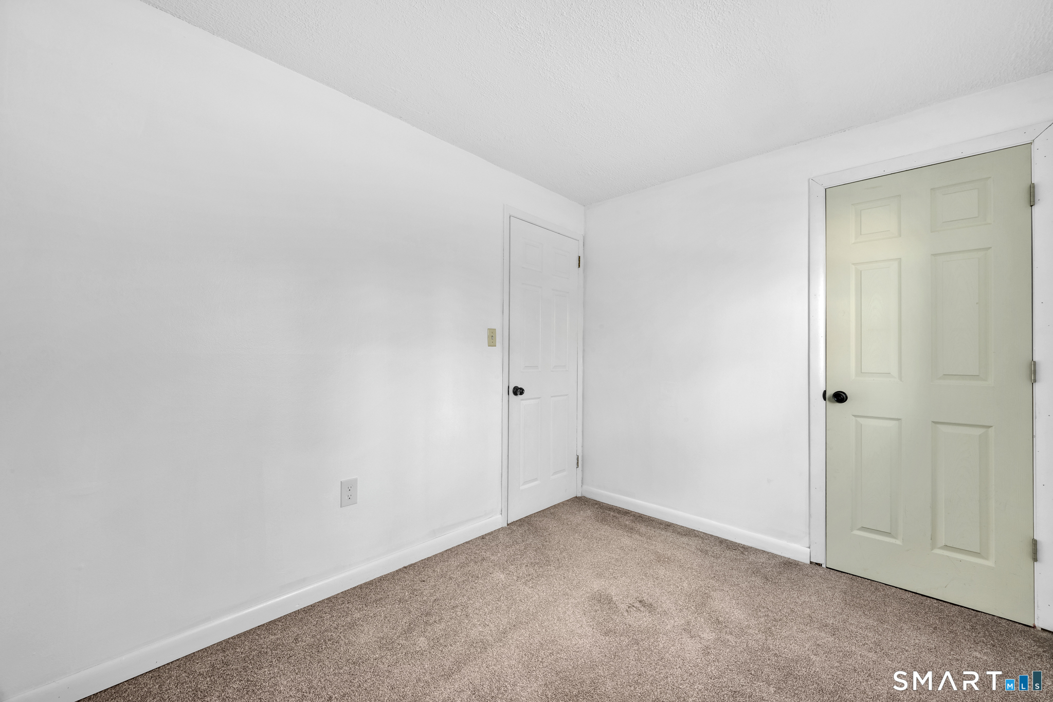 12 Nutmeg Drive Clinton, CT 06413 - Photo 22 of 26 a view of an empty room