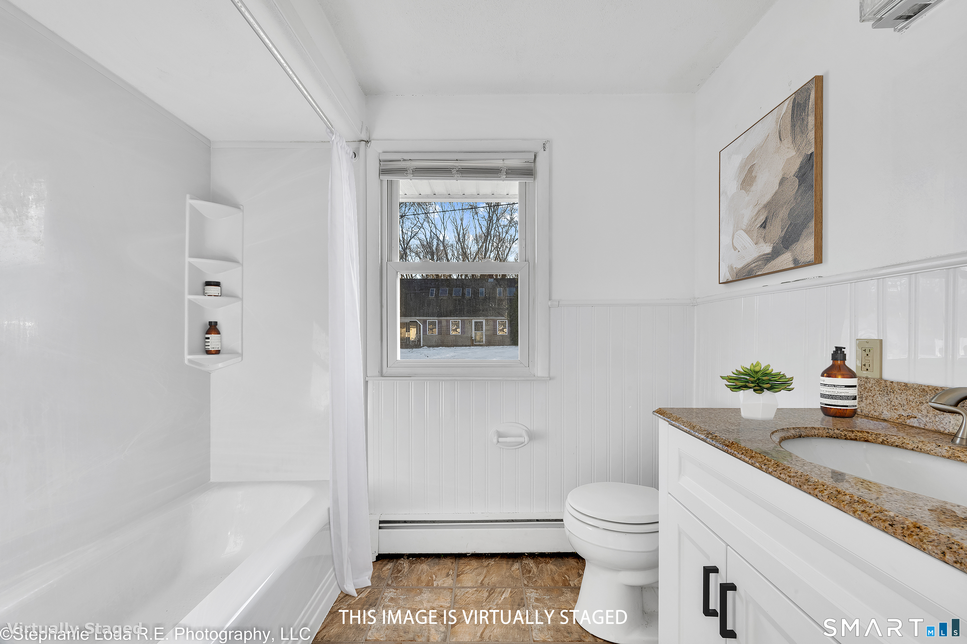 12 Nutmeg Drive Clinton, CT 06413 - Photo 23 of 26 a bathroom with a granite countertop toilet a sink and a bathtub