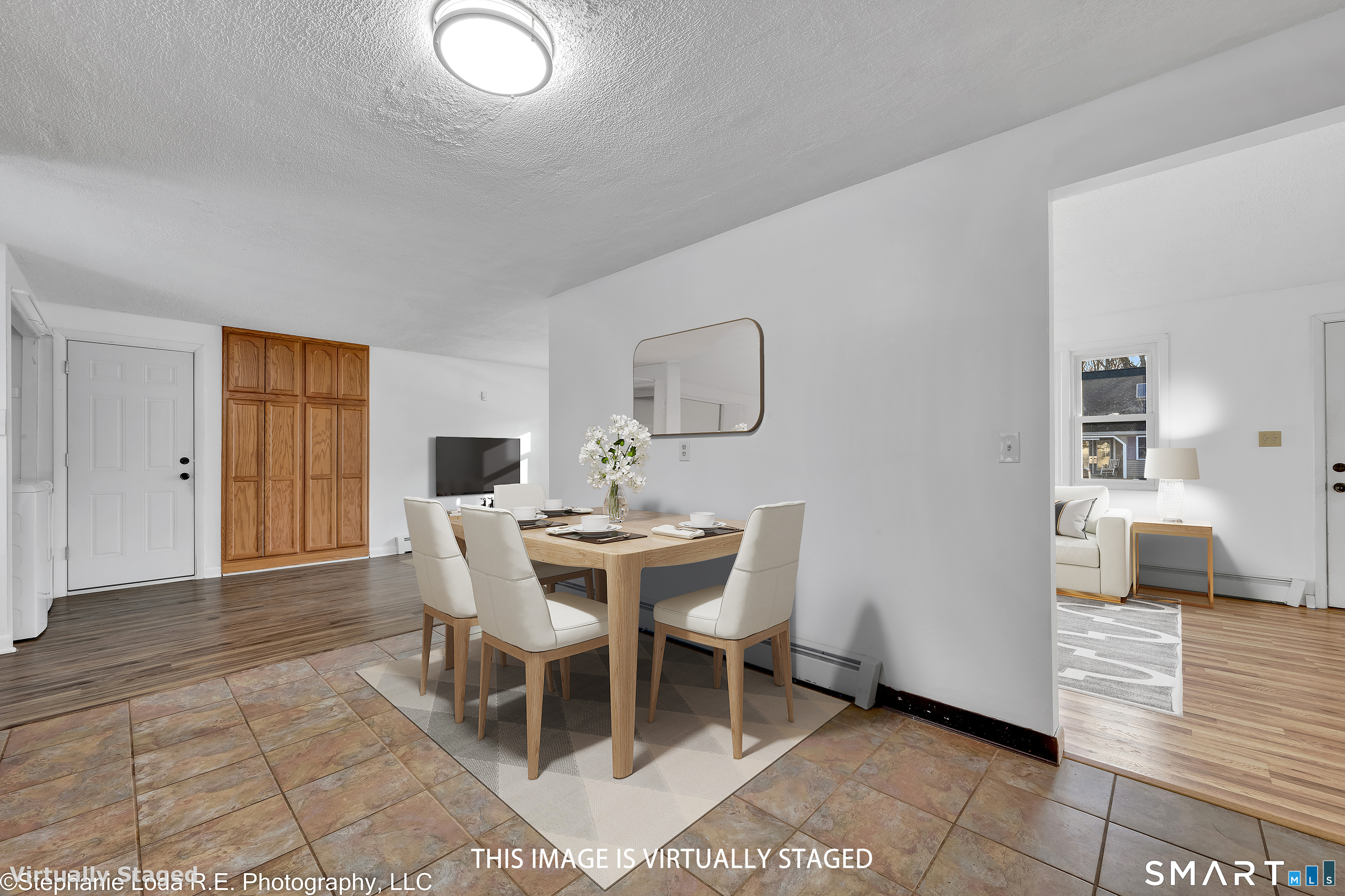12 Nutmeg Drive Clinton, CT 06413 - Photo 8 of 26 a view of a dining room with furniture