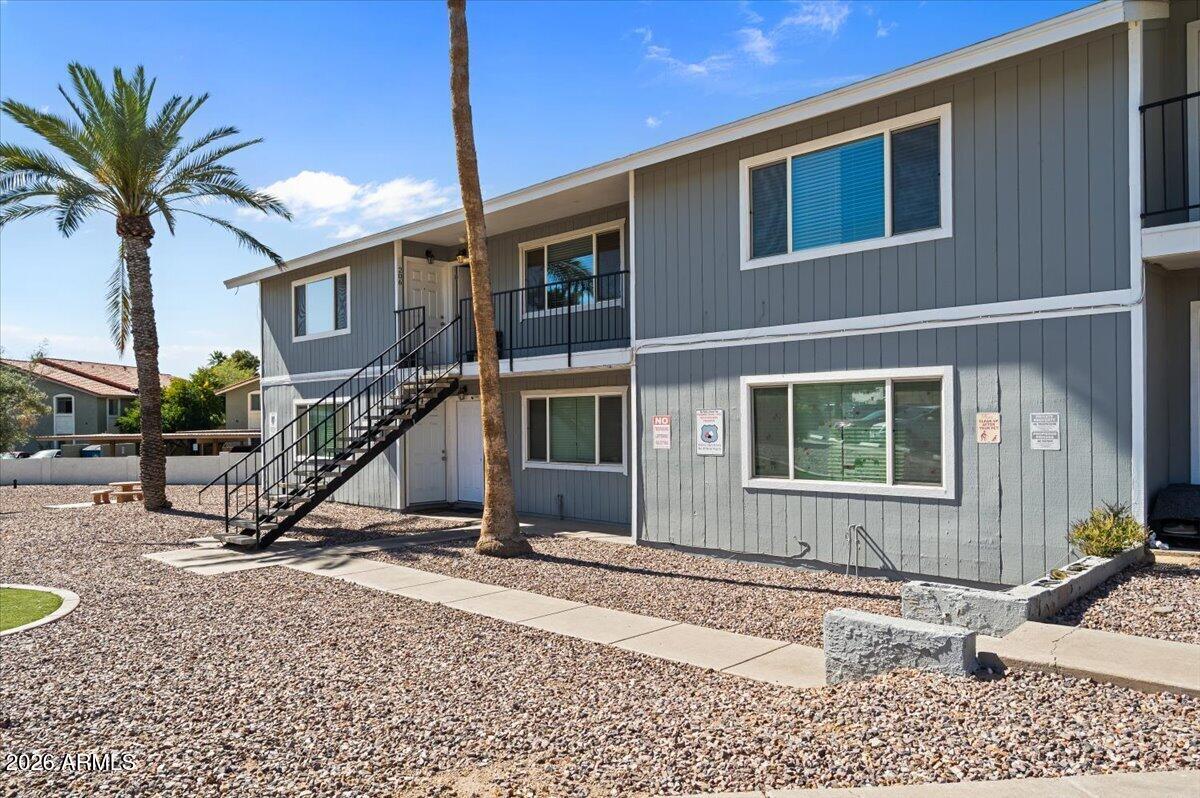 1346 East Mountain View Road, Unit 210 Phoenix, AZ 85020 - Photo 2 of 31 a house that has a wooden bench in it