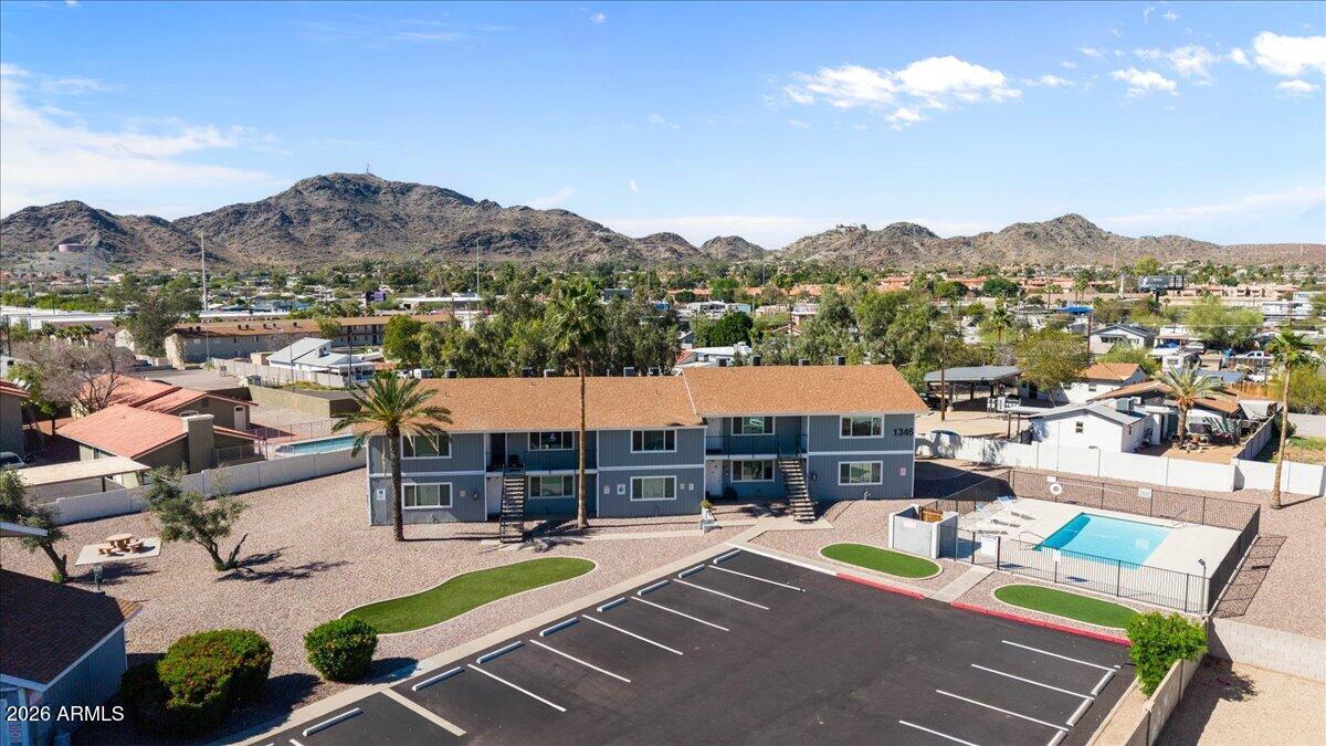 1346 East Mountain View Road, Unit 210 Phoenix, AZ 85020 - Photo 8 of 31 a view of a terrace with furniture