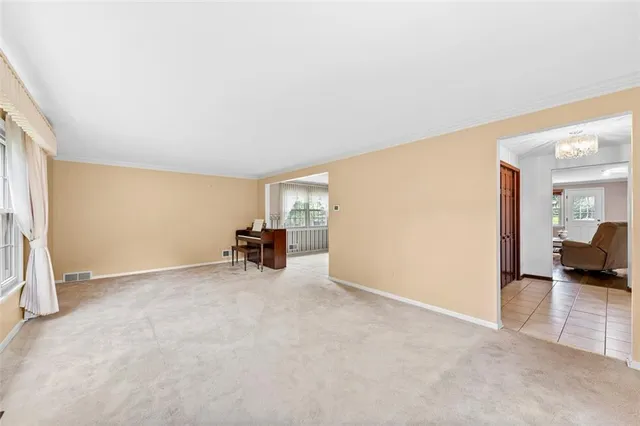 a view of a livingroom with workspace