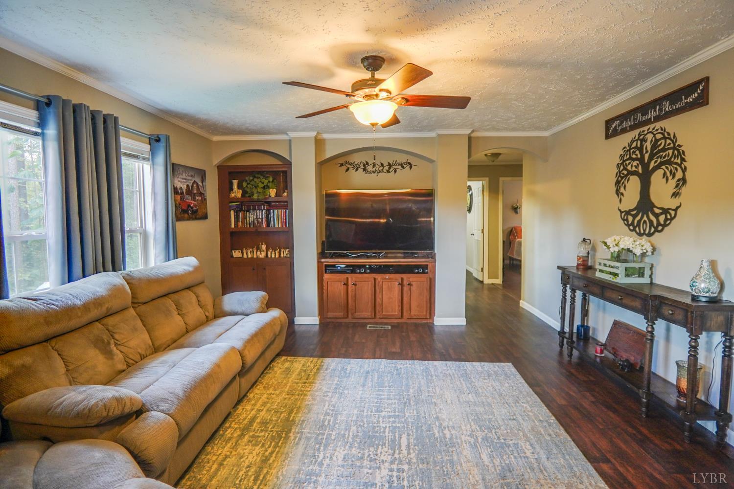 159 Hidden Trail Rustburg, VA 24588 - Photo 13 of 34 a living room with furniture and wooden floor