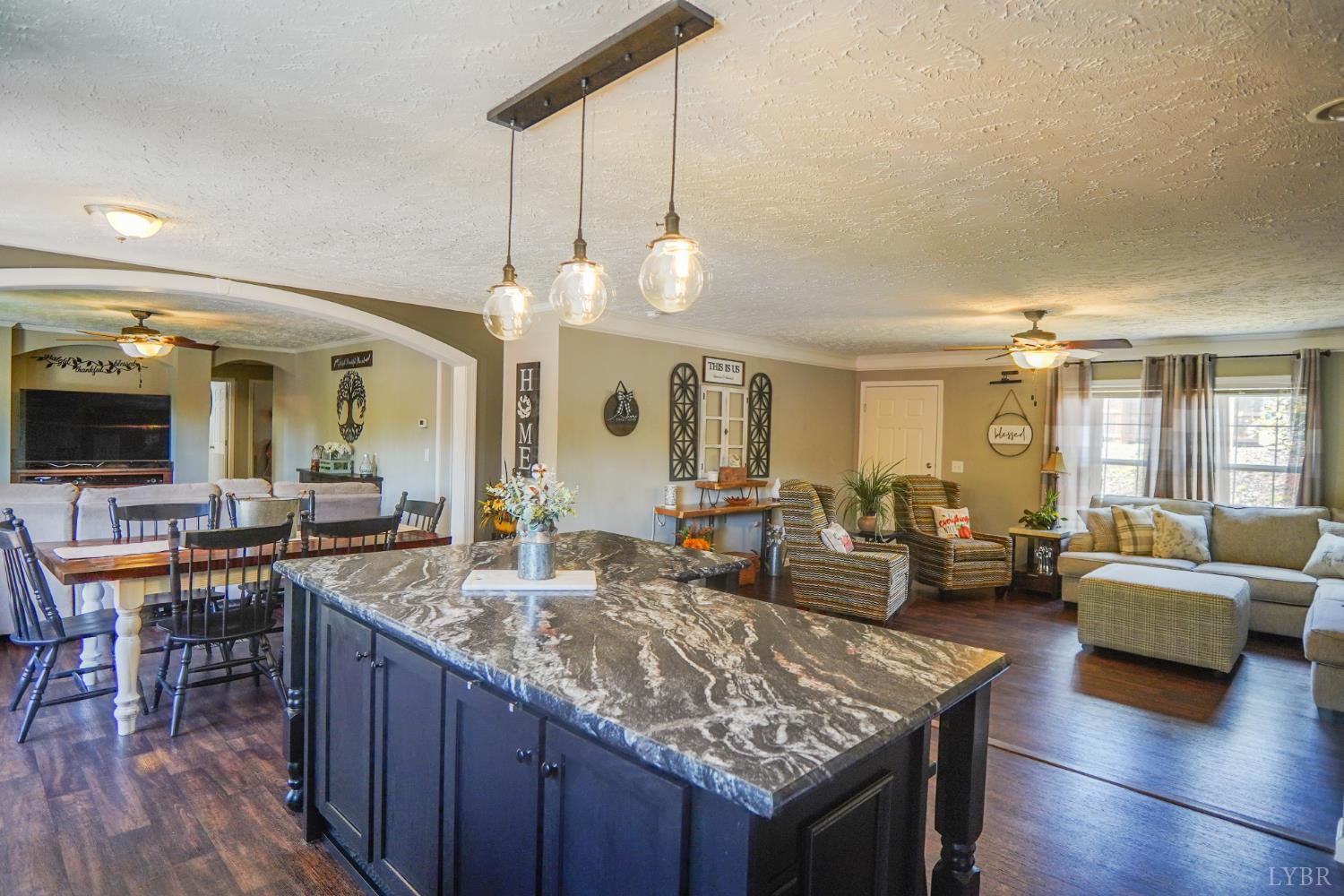 159 Hidden Trail Rustburg, VA 24588 - Photo 14 of 34 a large kitchen with lots of counter space and furniture