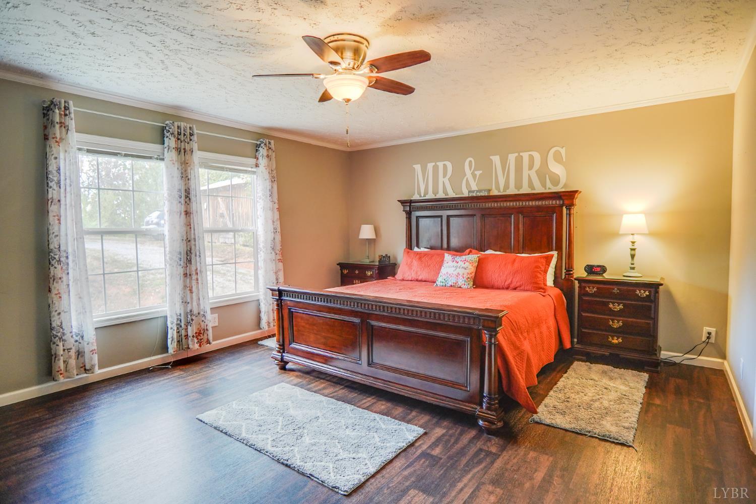 159 Hidden Trail Rustburg, VA 24588 - Photo 23 of 34 a bedroom with a bed and wooden floor