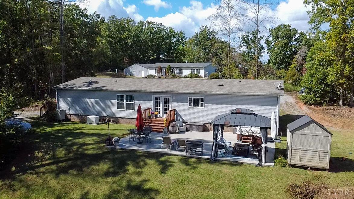 159 Hidden Trail Rustburg, VA 24588 - Photo 4 of 34 a view of a house with pool and chairs