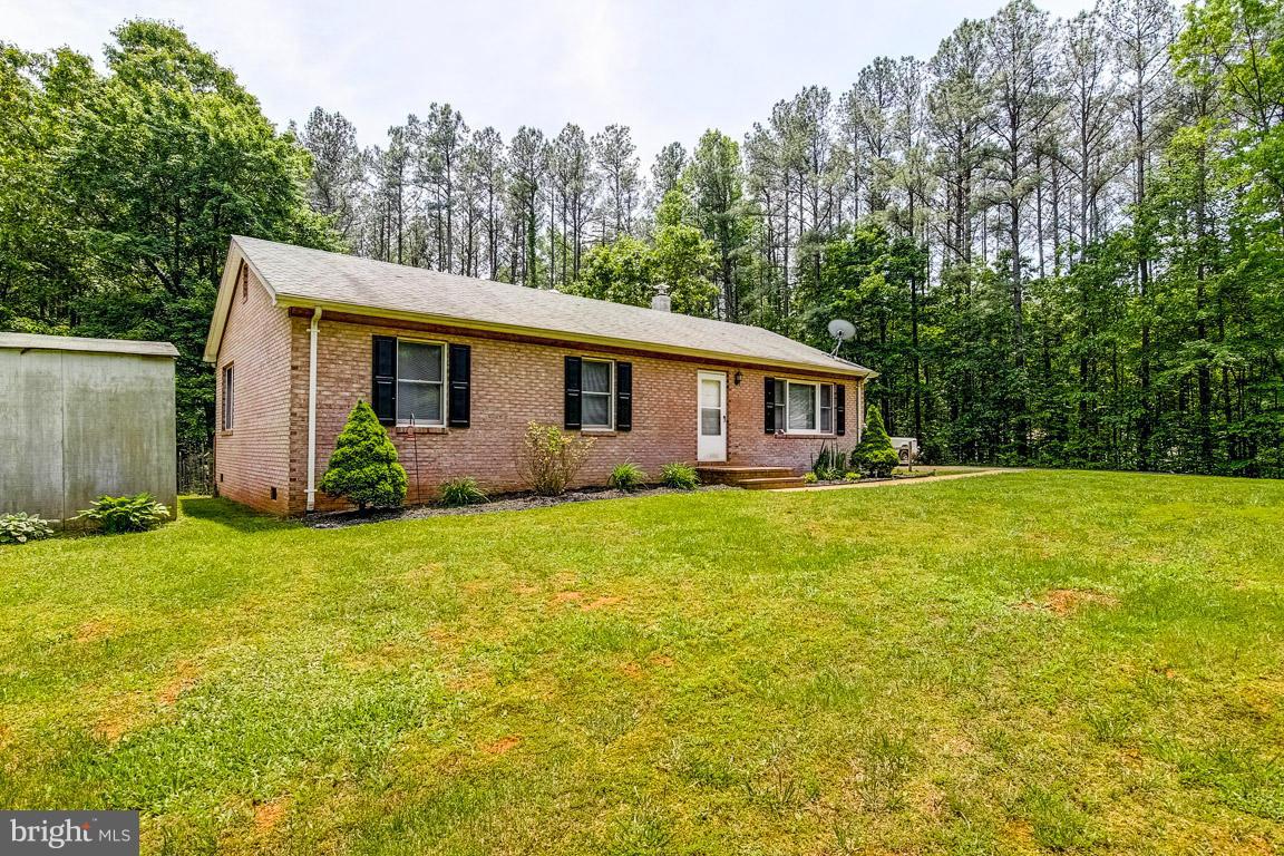 13367 Union Church Road Sumerduck, VA 22742 - Photo 2 of 30 a view of a house with backyard and garden