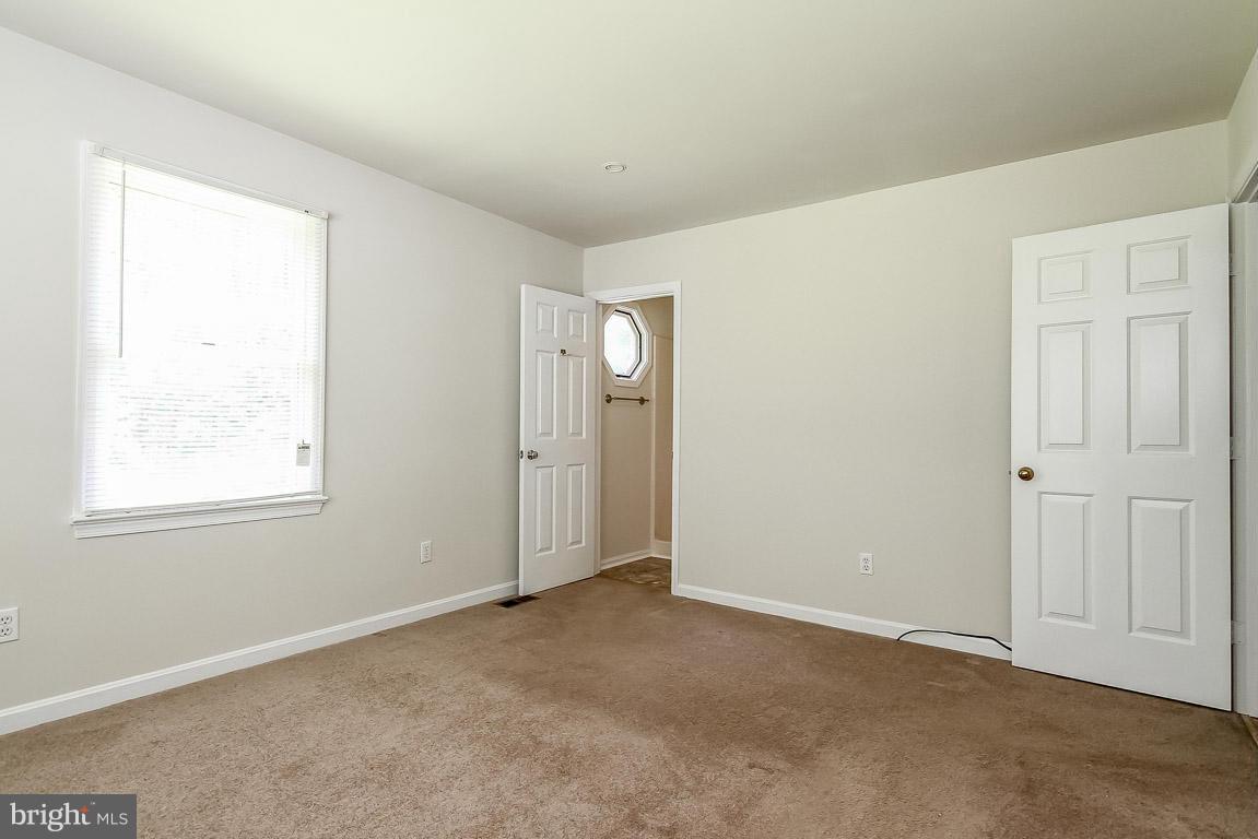 13367 Union Church Road Sumerduck, VA 22742 - Photo 27 of 30 an empty room with windows and closet