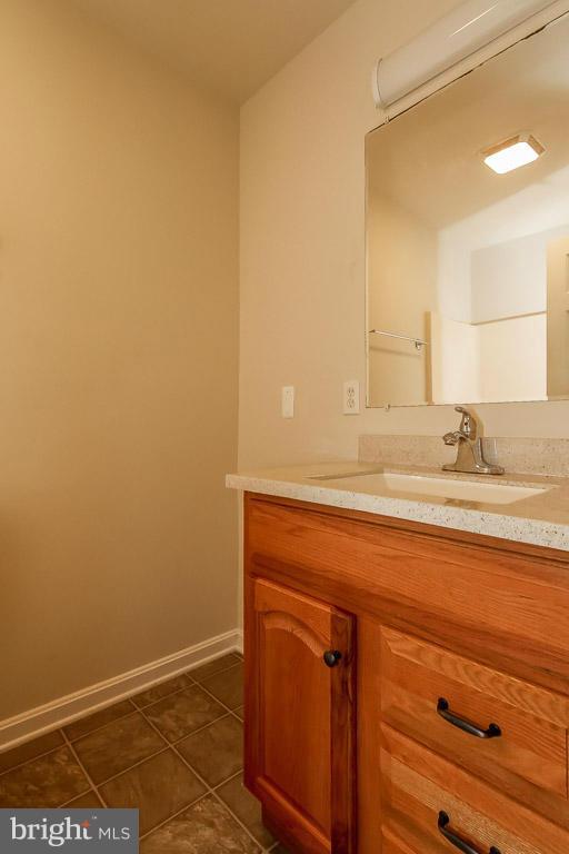 13367 Union Church Road Sumerduck, VA 22742 - Photo 30 of 30 a bathroom with a sink and a mirror
