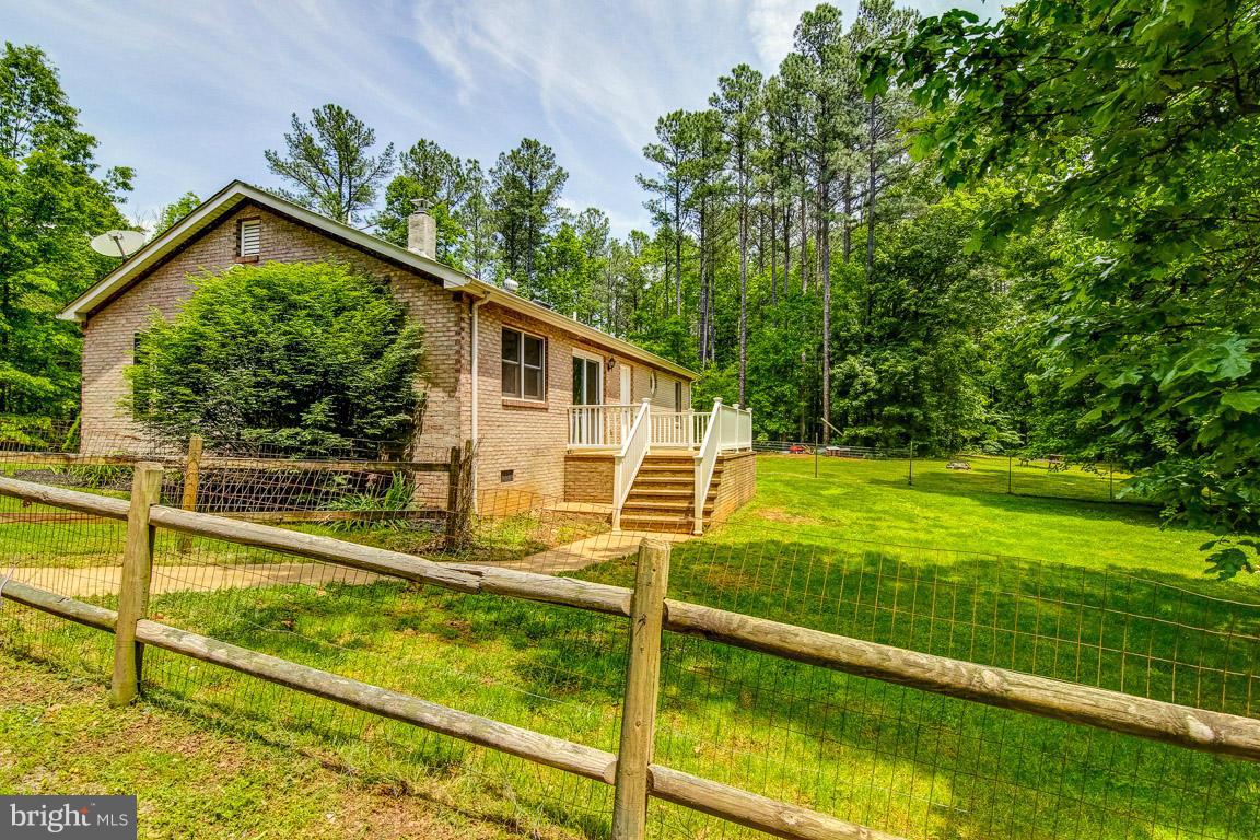 13367 Union Church Road Sumerduck, VA 22742 - Photo 4 of 30 a view of a house with a backyard