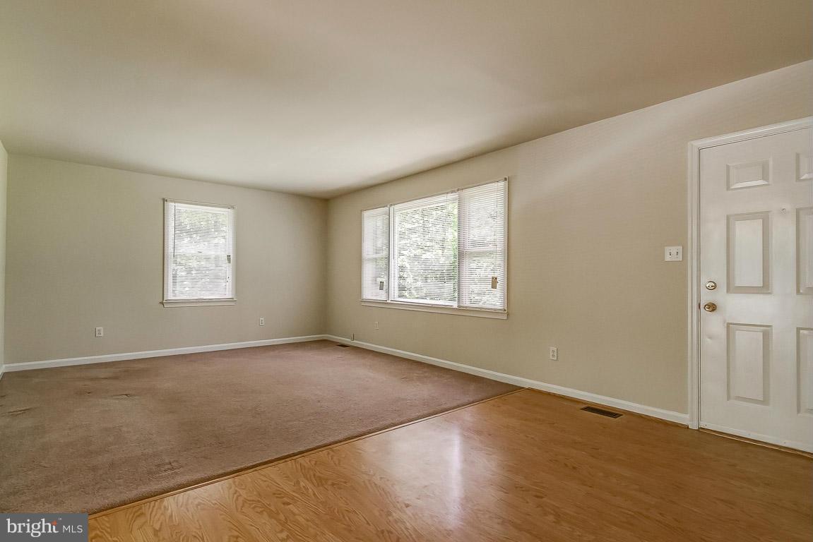 13367 Union Church Road Sumerduck, VA 22742 - Photo 10 of 30 an empty room with wooden floor and windows