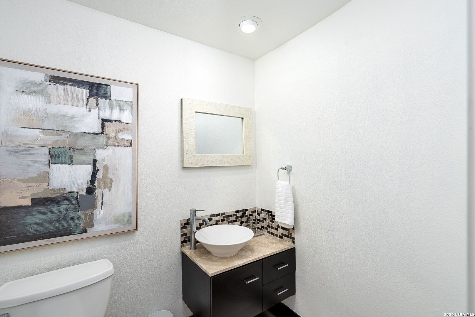 7701 Wurzbach Road, Unit 2302 San Antonio, TX 78229 - Photo 12 of 49 a bathroom with a sink toilet and shower