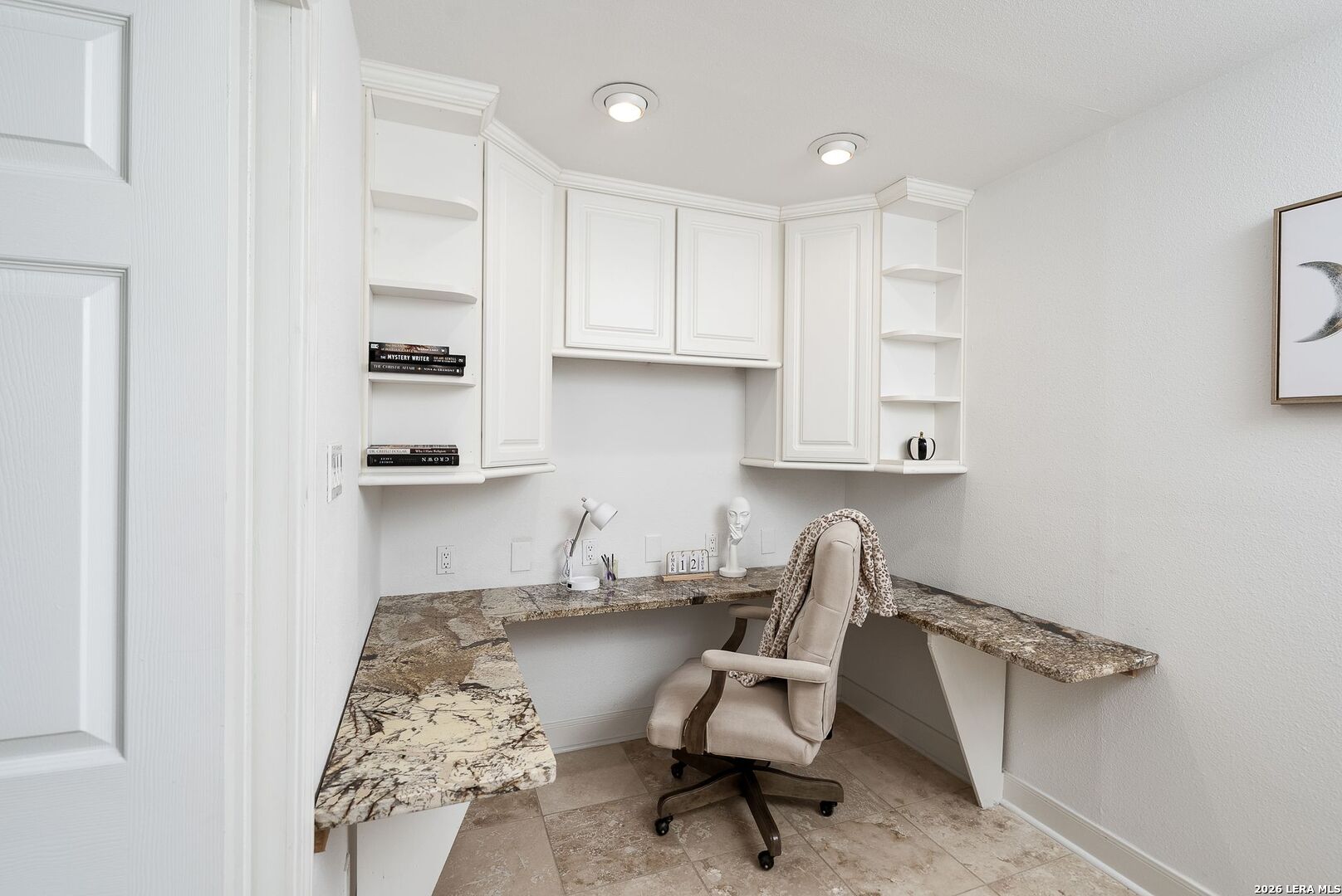 7701 Wurzbach Road, Unit 2302 San Antonio, TX 78229 - Photo 16 of 49 a workspace with furniture and rug